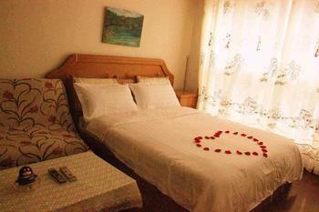 Yangguang Xingzuo Apartment Hotel Csungking Kültér fotó