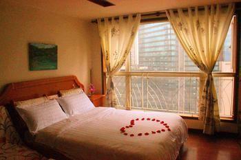 Yangguang Xingzuo Apartment Hotel Csungking Kültér fotó
