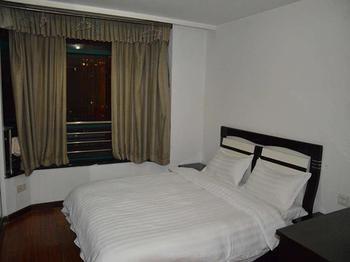 Yangguang Xingzuo Apartment Hotel Csungking Kültér fotó