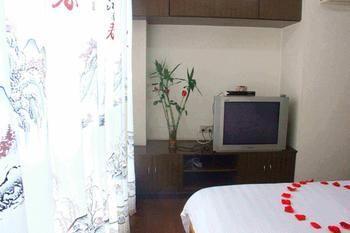 Yangguang Xingzuo Apartment Hotel Csungking Kültér fotó