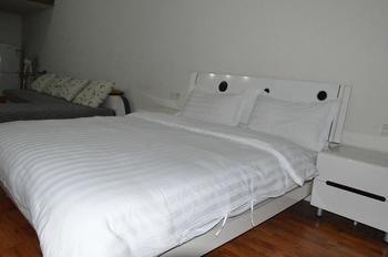Yangguang Xingzuo Apartment Hotel Csungking Kültér fotó