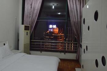 Yangguang Xingzuo Apartment Hotel Csungking Kültér fotó