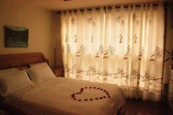 Yangguang Xingzuo Apartment Hotel Csungking Kültér fotó